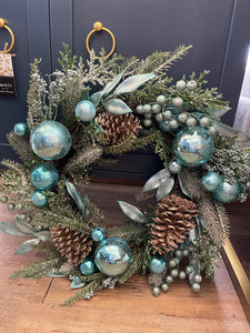 Blue ornament pine cone wreath