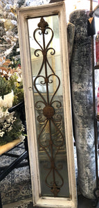 Antique mirror with iron scroll design